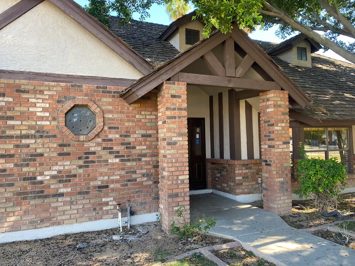 Brick exterior of a home before painting