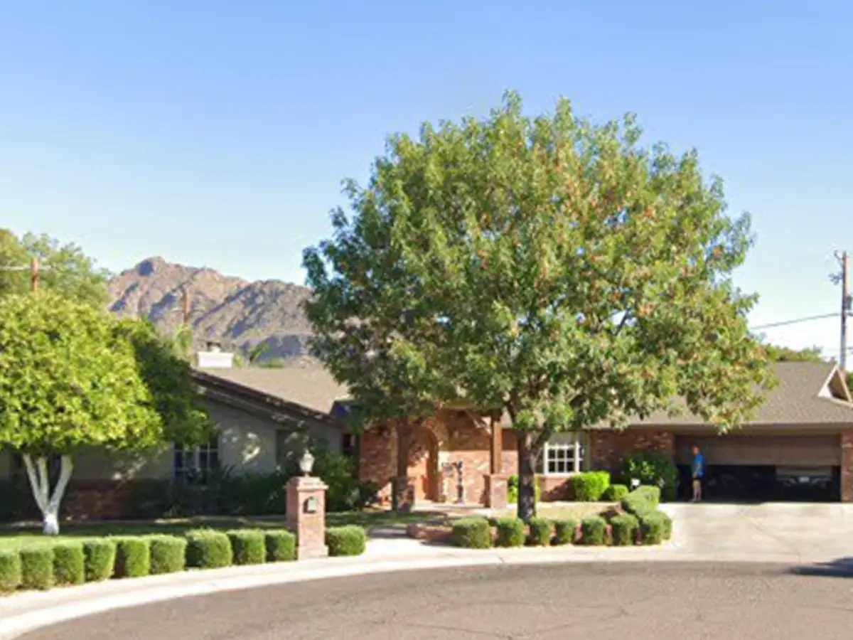 Older arizona home with brick exterior prior to painting