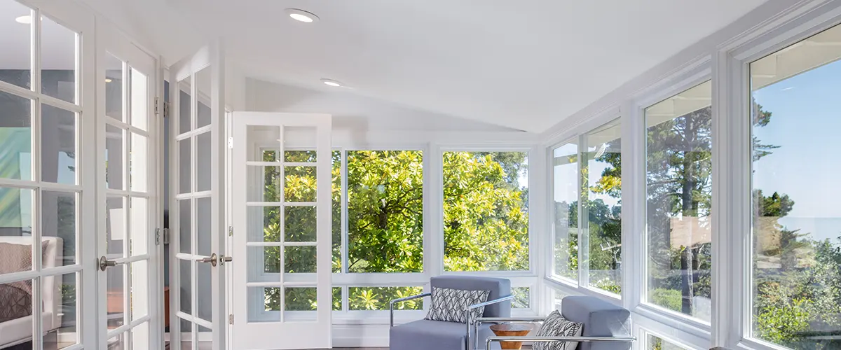 beautiful sunroom with large windows